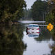 A disabled car is surrounded by floodwaters caused by Hurricane Florence near the Todd Swamp on September 21, 2018 in Longs, South Carolina. Floodwaters are expected to rise in the area in through the weekend.